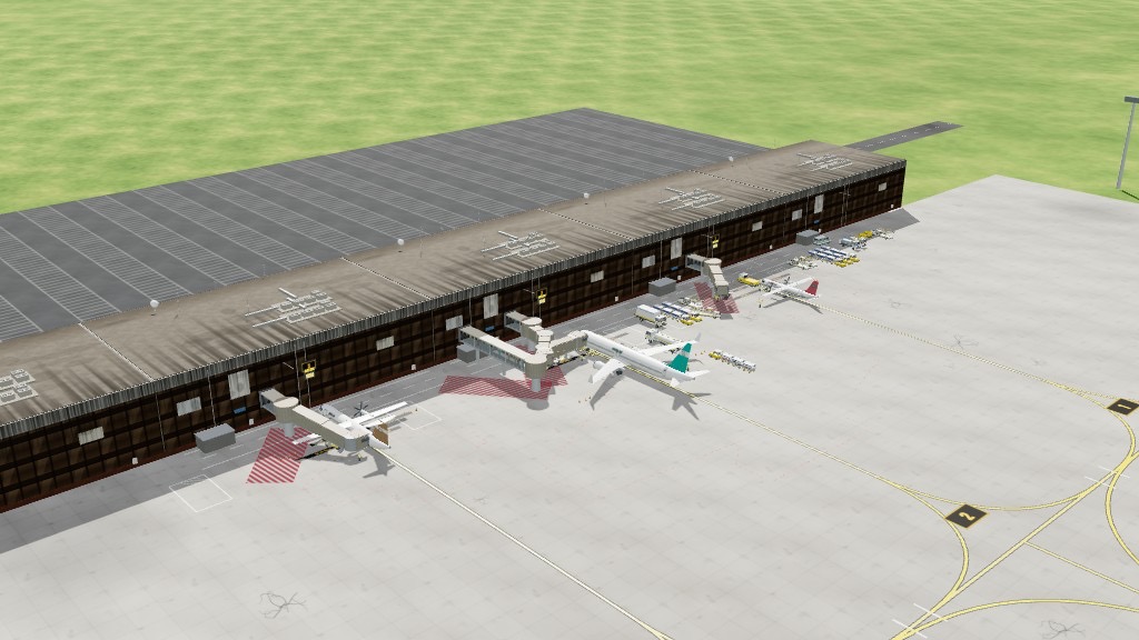 Apron with a turboprop, a jet taxiing, a hangar, fire station and fuel farm